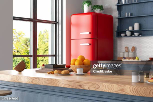 cozy retro kitchen interior with a red fridge and ktichen counter - inside of fridge stock pictures, royalty-free photos & images