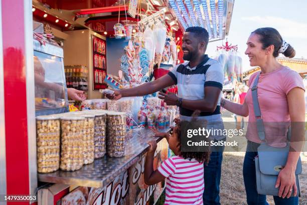 paying for pick n mix - fairground stall stock pictures, royalty-free photos & images