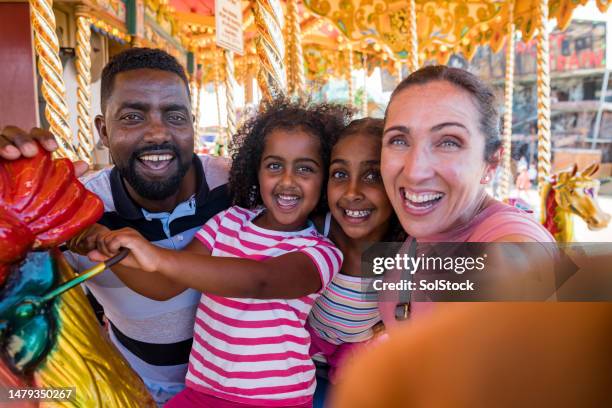 one happy family - family life stock pictures, royalty-free photos & images