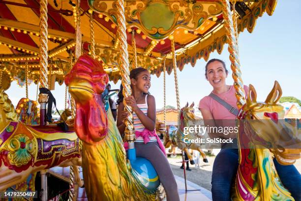 the crazy carousel - amusement park ride stock pictures, royalty-free photos & images