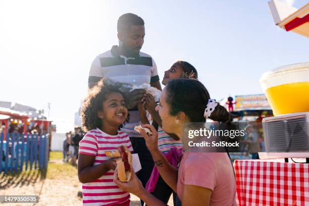 a very tasty hot dog - family summer holiday stock pictures, royalty-free photos & images