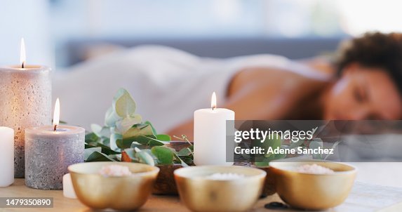 Relax, spa and zen woman with candles for beauty, physical therapy or skincare. Female client on table with candle in ambient room for cosmetics or luxury treatment for skin, health and wellness Relax, spa and zen woman with candles for beauty, physical therapy or skincare. Female client on table with candle in ambient room for cosmetics or luxury treatment for skin, health and wellness