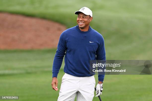 Tiger Woods of the United States warms up on the practice area prior to the 2023 Masters Tournament at Augusta National Golf Club on April 03, 2023...