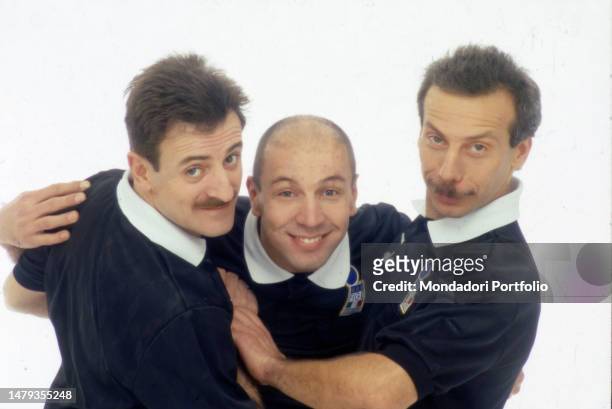 The Italian comedy trio Aldo , Giovanni and Giacomo disguised as footballers during the television program Mai Dire Gol. Italy, 1995