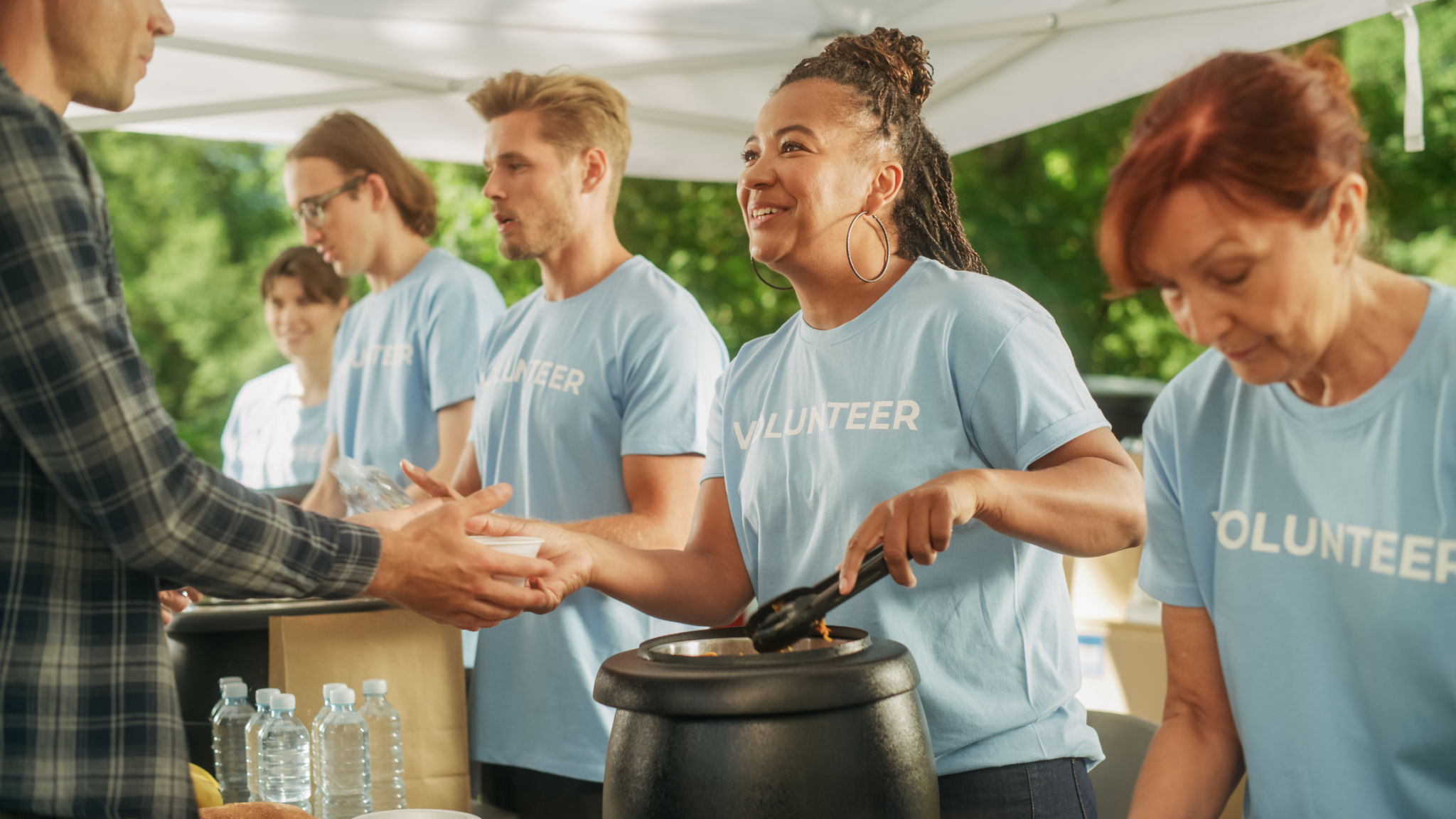 volunteers serving meals