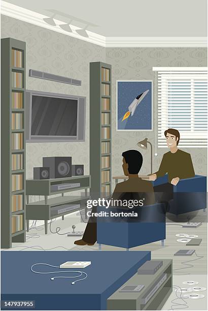 zwei männer sitzen vor einem home-entertainment-center - männerhöhle stock-grafiken, -clipart, -cartoons und -symbole