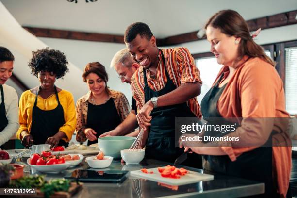 diverse friends cooking and bonding. - chef demonstration stock pictures, royalty-free photos & images