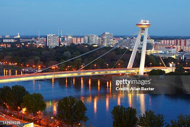 view over novy most bridge at night - bratislava slovakia stock pictures, royalty-free photos & images