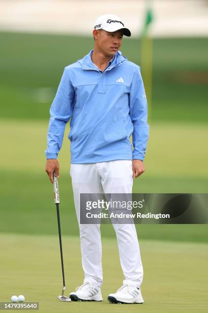 Collin Morikawa of the United States putts on the practice area during a practice round prior to the 2023 Masters Tournament at Augusta National Golf...