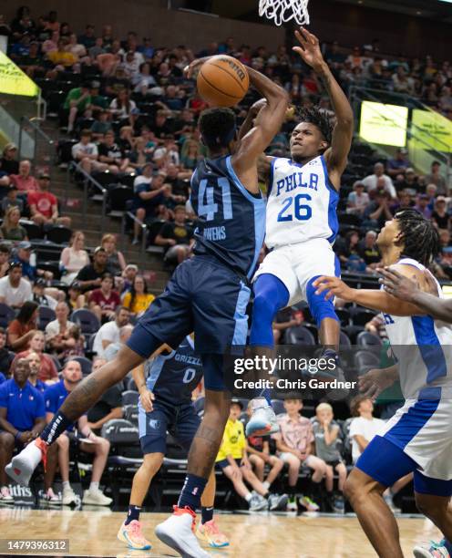 Tariq Owens of the Memphis Grizzlies blocks a shot by Terquavion Smith of the Philadelphia 76ers during the first half of their NBA Summer League...