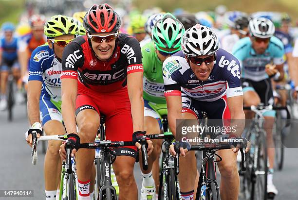 Marus Burghardt of Germany and the BMC Racing Team rides with Adam Hansen of Australia and the Lotto Belisol team during stage five of the 2012 Tour...