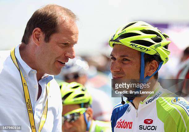 Race Director Christian Prudhomme chats to Ivan Basso of Italy and Liquigas-Cannondale at the start of stage five of the 2012 Tour de France from...