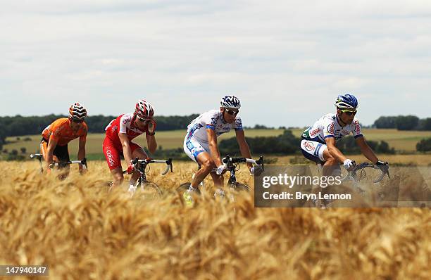 The breakaway group ride during stage five of the 2012 Tour de France from Rouen to Saint-Quentin on July 5, 2012 in Saint-Quentin, France.