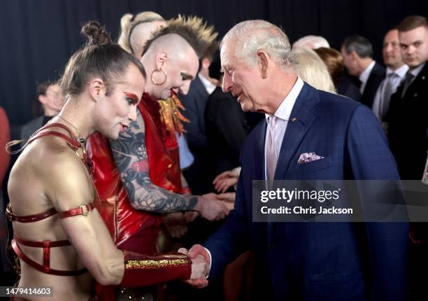 King Charles III greets glam-rock band ' Lords of The Lost' at a reception at Shuppen 52 on March 31, 2023 in Hamburg, Germany. The King and The...