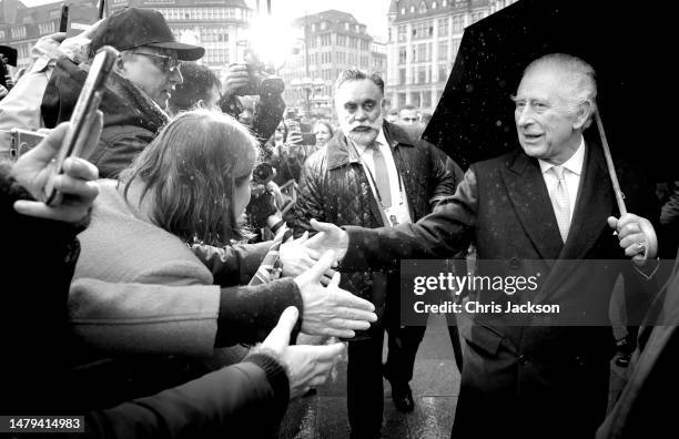 King Charles II meets members of the public outside Hamburg City Hall on March 31, 2023 in Hamburg, Germany. The King and The Queen Consort's first...