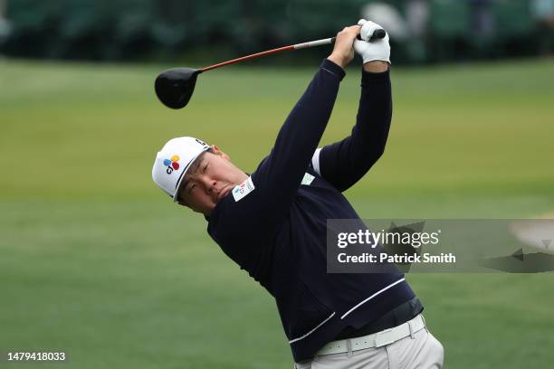 Sungjae Im of South Korea plays his shot from the third tee during a practice round prior to the 2023 Masters Tournament at Augusta National Golf...