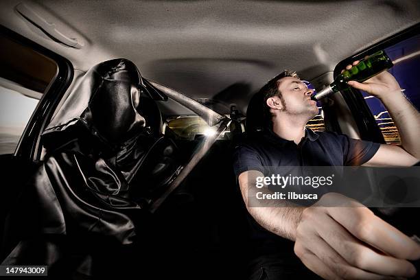 drinking while driving - blind spot stock pictures, royalty-free photos & images