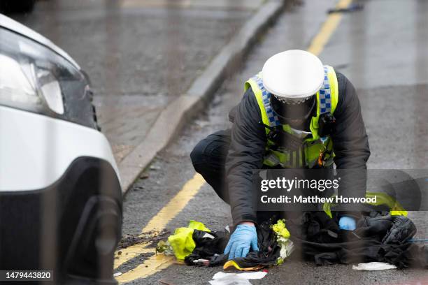 Police attend an incident involving a white van on North Road on March 28, 2023 in Cardiff, Wales. Christopher Elgifari indicated a plea of not...