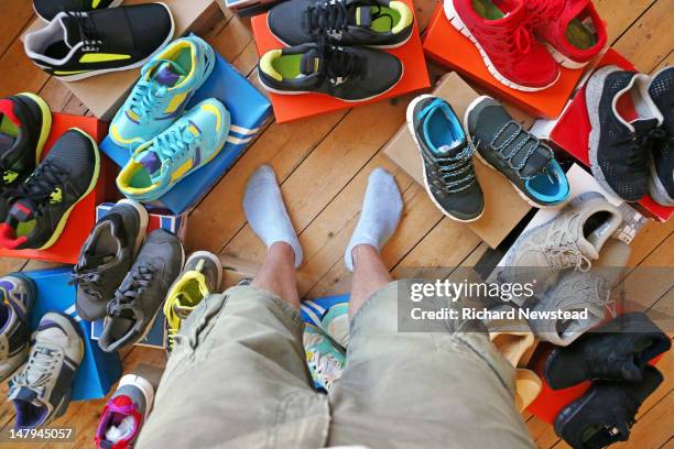 choice of footwear - sportschoen stockfoto's en -beelden