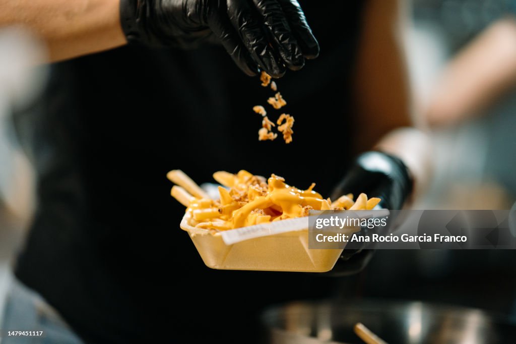 French fries with fried onion from a foodtruck
