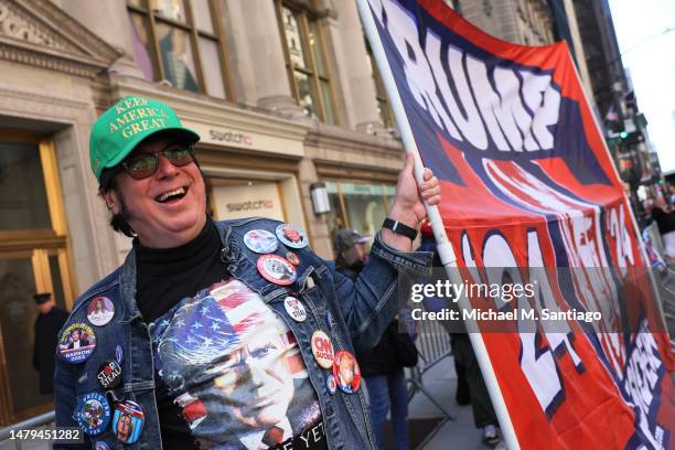 Supporters of former President Donald Trump wait for his arrival at Trump Tower on April 03, 2023 in New York City. Former President Trump is...