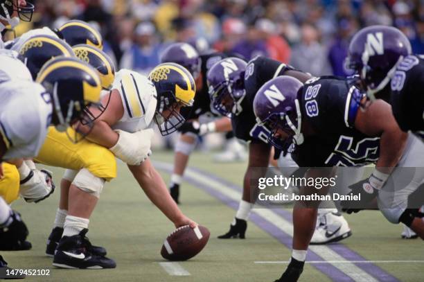 Steve Everitt, Center for the University of Michigan Wolverines prepares to snap the football on the line of scrimmage during the NCAA Big Ten...