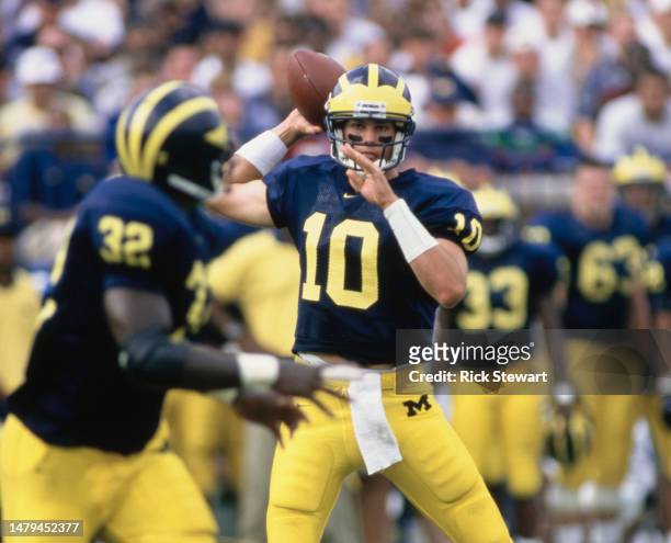 Tom Brady, Quarterback for the University of Michigan Wolverines prepares to throw a pass to Running Back Anthony Thomas during the NCAA Big 10...