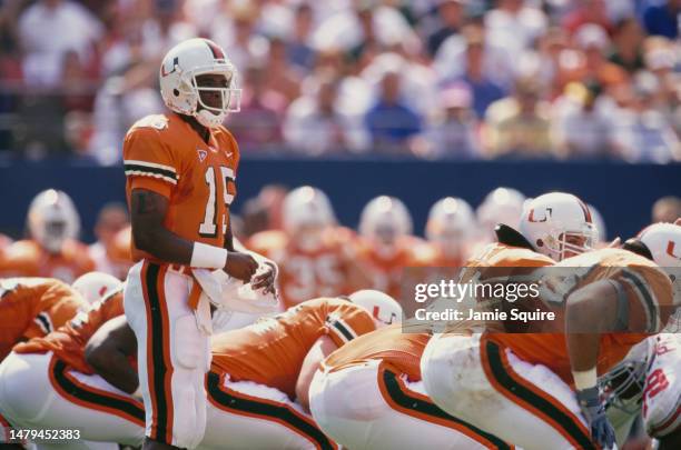 Kenny Kelly, Quarterback for the University of Miami Hurricanes calls the play on the line of scrimmage during the NCAA Kickoff Classic college...