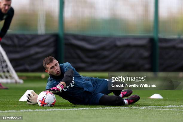 Emi Martinez of Aston Villa in action during a training session at Bodymoor Heath training ground on April 03, 2023 in Birmingham, England.