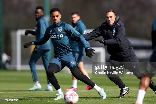 Jacob Ramsey of Aston Villa in action during a training session at Bodymoor Heath training ground on April 03, 2023 in Birmingham, England.
