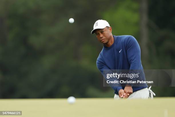 Tiger Woods of the United States plays a shot during a practice round prior to the 2023 Masters Tournament at Augusta National Golf Club on April 03,...