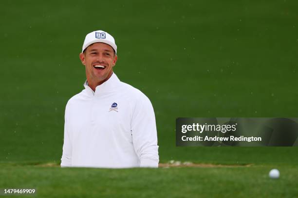 Bryson DeChambeau of the United States looks on in the practice area prior to the 2023 Masters Tournament at Augusta National Golf Club on April 03,...