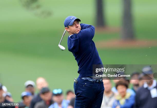 Rory McIlroy of Northern Ireland plays his second shot on the 17th hole during a practice round prior to the 2023 Masters Tournament at Augusta...