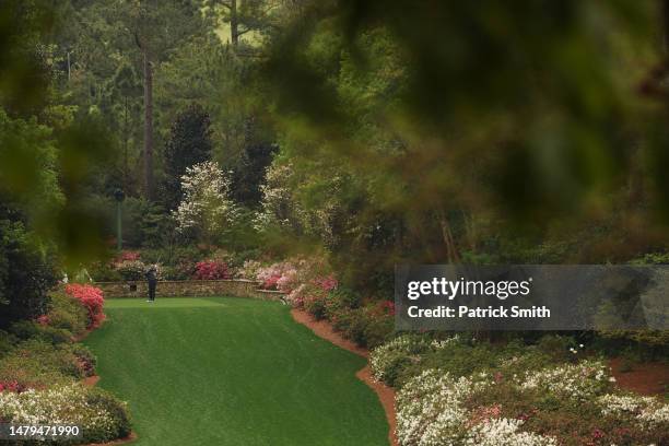 Tony Finau of the United States plays his shot from the 13th tee during a practice round prior to the 2023 Masters Tournament at Augusta National...