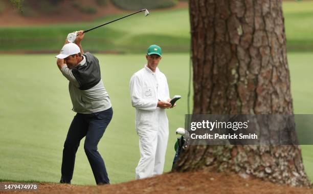 Scottie Scheffler of the United States plays a shot on the 13th hole during a practice round prior to the 2023 Masters Tournament at Augusta National...