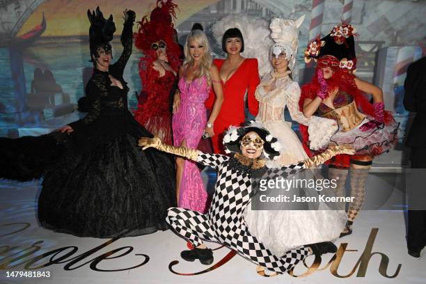 Lillian Gorbachincky and guest pose with dancers at Carole Roth's 100th Birthday Celebration at The Temple House on March 26, 2023 in Miami Beach,...