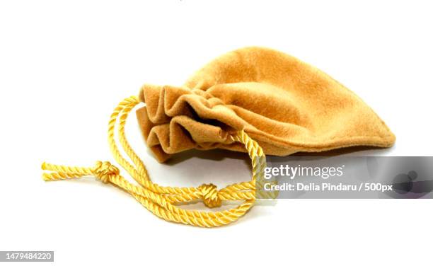 jewelry bag isolated on white background,romania - gold sack stock pictures, royalty-free photos & images