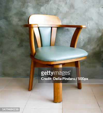 Empty chair against wall,Romania