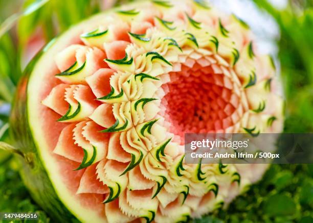 fruit and vegetable carvings,display thai fruit carving decoration,romania - thai fruit carving stock pictures, royalty-free photos & images