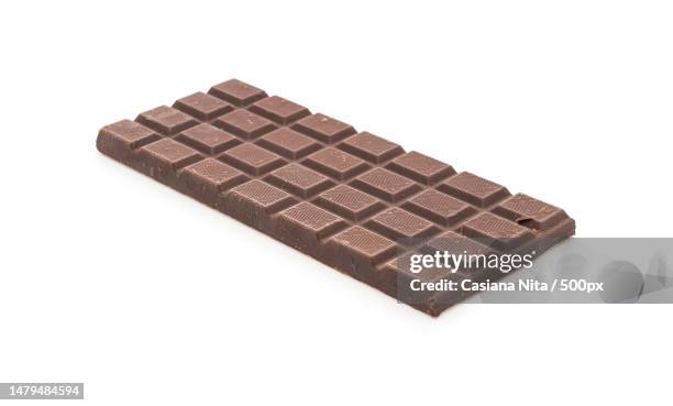 close-up of chocolate bar against white background,romania - caramel block stock pictures, royalty-free photos & images