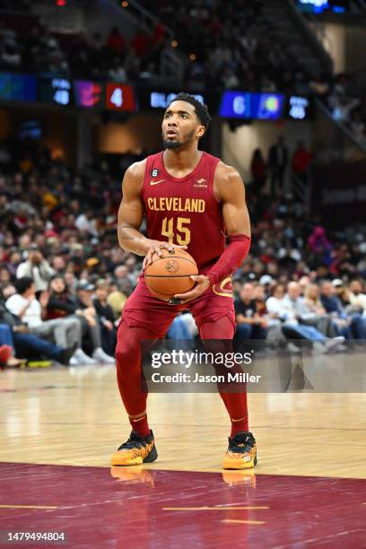 Donovan Mitchell of the Cleveland Cavaliers shoots a free throw during the third quarter against the Indiana Pacers at Rocket Mortgage Fieldhouse on...