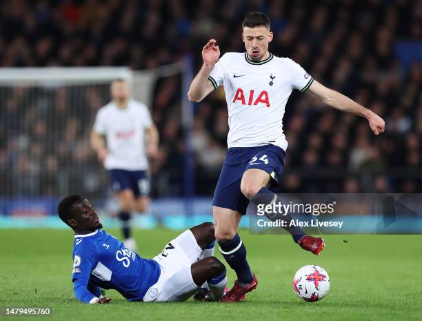 Clement Lenglet of Tottenham Hotspur is tackled by Idrissa Gueye of Everton during the Premier League match between Everton FC and Tottenham Hotspur...