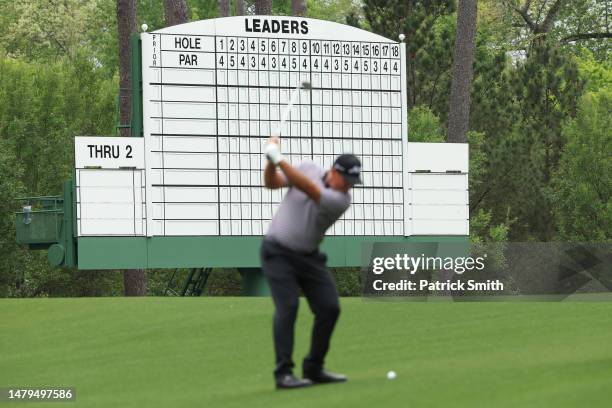 Patrick Reed of the United States plays a shot on the third hole during a practice round prior to the 2023 Masters Tournament at Augusta National...