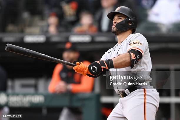 David Villar of the San Francisco Giants hits a home run in the fifth inning against the Chicago White Sox at Guaranteed Rate Field on April 03, 2023...
