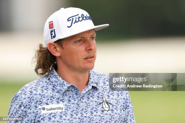 Cameron Smith of Australia looks on from the practice area during a practice round prior to the 2023 Masters Tournament at Augusta National Golf Club...