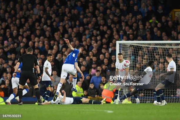 Michael Keane of Everton scores the team's first goal during the Premier League match between Everton FC and Tottenham Hotspur at Goodison Park on...