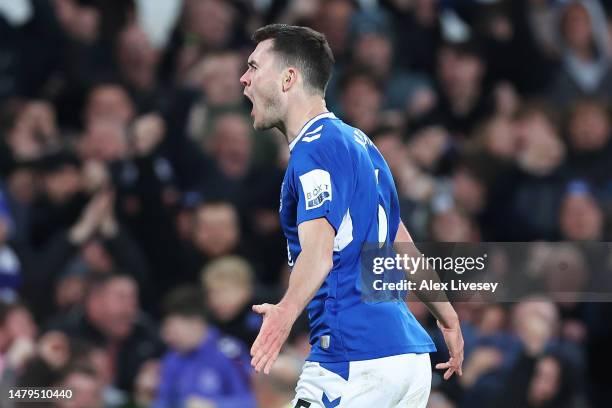 Michael Keane of Everton celebrates after scoring the team's first goal during the Premier League match between Everton FC and Tottenham Hotspur at...