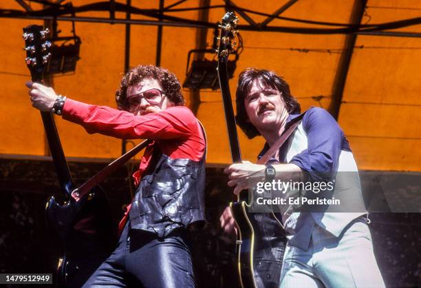 Eric Bloom and Buck Dharma perform with Blue Oyster Cult at Oakland Stadium on September 2, 1978 in Oakland, California.