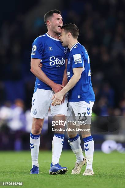 Michael Keane and Seamus Coleman of Everton celebrate following the Premier League match between Everton FC and Tottenham Hotspur at Goodison Park on...