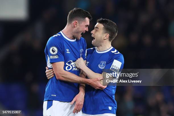 Michael Keane and Seamus Coleman of Everton celebrate following the Premier League match between Everton FC and Tottenham Hotspur at Goodison Park on...